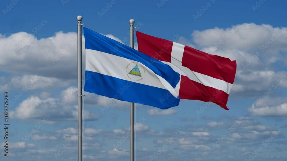 Denmark and Nicaragua flags flying together, video concept of the relationship, two country relations concept Denmark and Nicaragua flags flying together, video concept of the relationship, two country relations concept