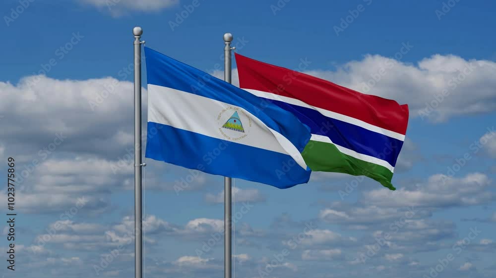 Gambia and Nicaragua flags flying together, video concept of the relationship, two country relations concept Gambia and Nicaragua flags flying together, video concept of the relationship, two country relations concept