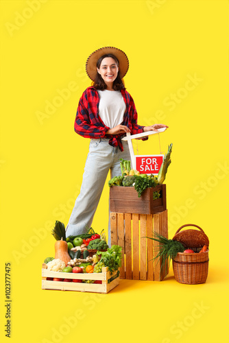 Female farmer with fresh ve...