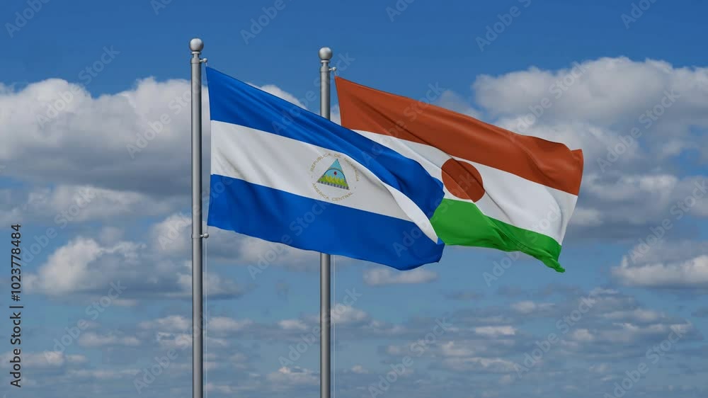 Niger and Nicaragua flags flying together, video concept of the relationship, two country relations concept Niger and Nicaragua flags flying together, video concept of the relationship, two country relations concept