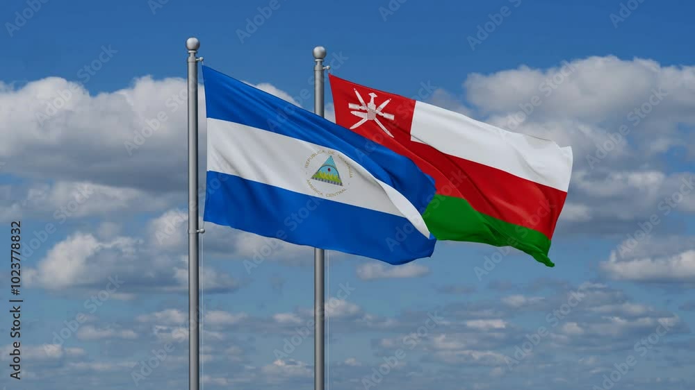 Oman and Nicaragua flags flying together, video concept of the relationship, two country cooperation concept Oman and Nicaragua flags flying together, video concept of the relationship, two country cooperation concept