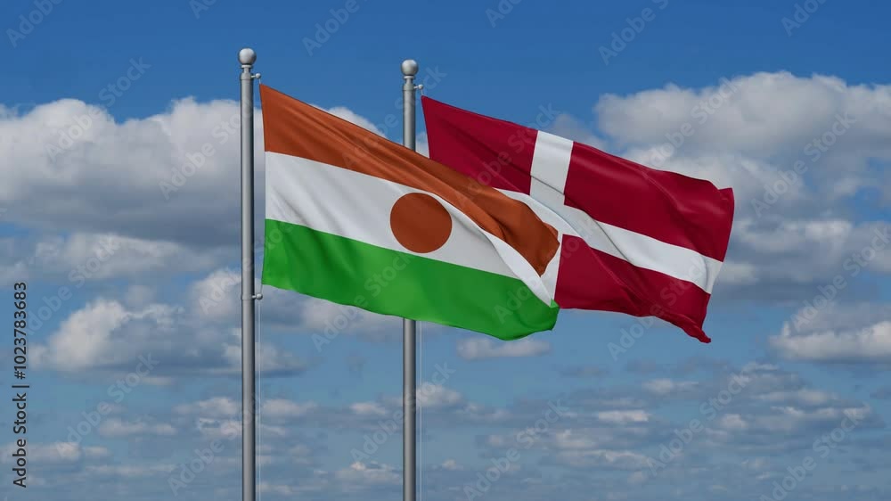 Denmark and Niger flags flying together, video concept of the relationship, two country relations concept Denmark and Niger flags flying together, video concept of the relationship, two country relations concept