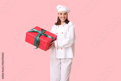 Beautiful female chef with ...