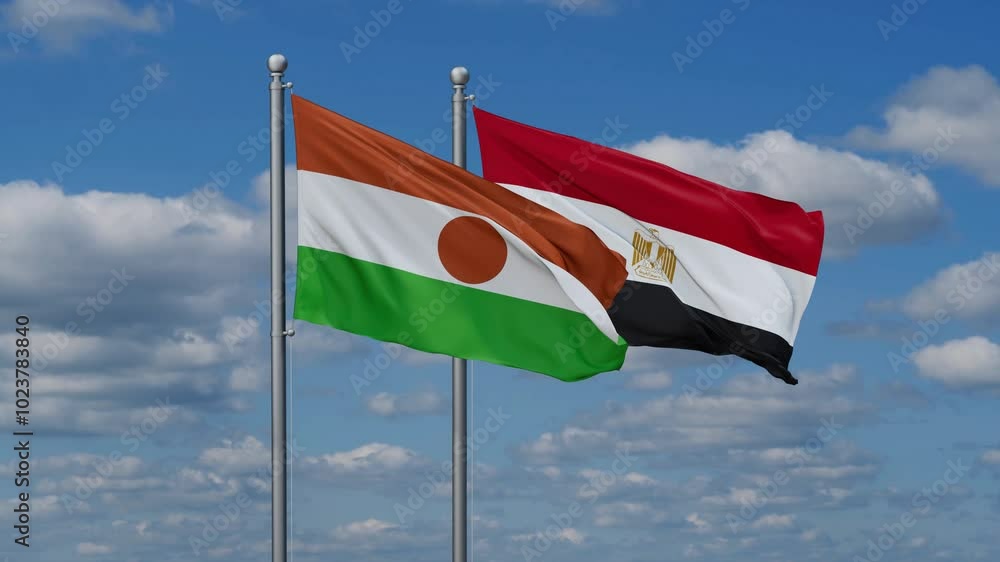 Egypt and Niger flags flying together, video concept of the relationship, two country relations concept Egypt and Niger flags flying together, video concept of the relationship, two country relations concept