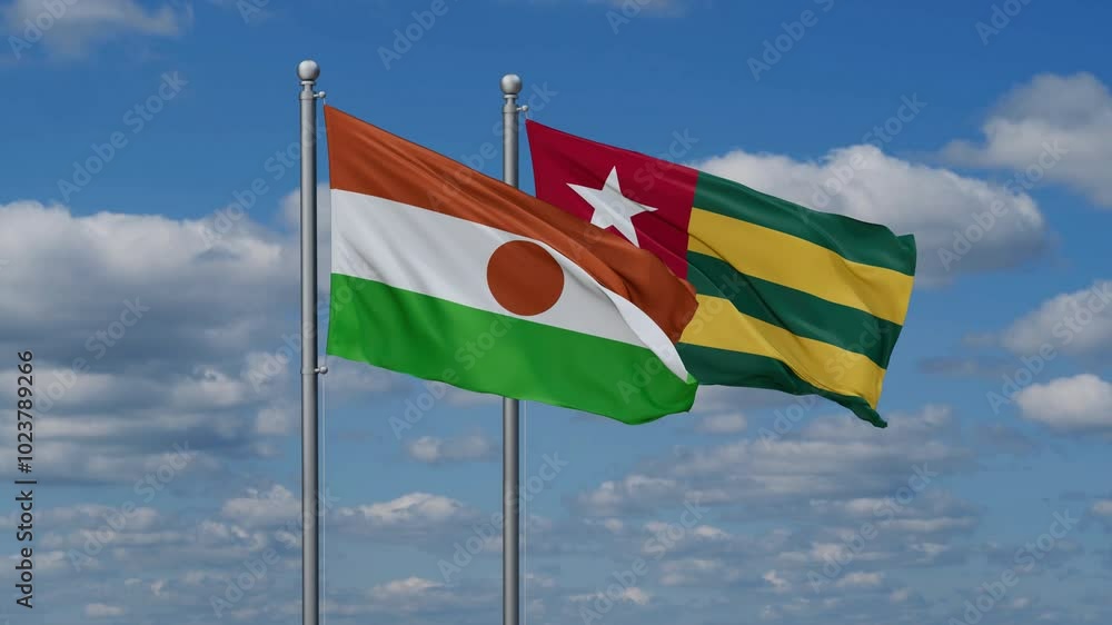 Togo, Togolese Republic and Niger flags flying together, video concept of the relationship, two country cooperation concept Togo, Togolese Republic and Niger flags flying together, video concept of the relationship, two country cooperation concept