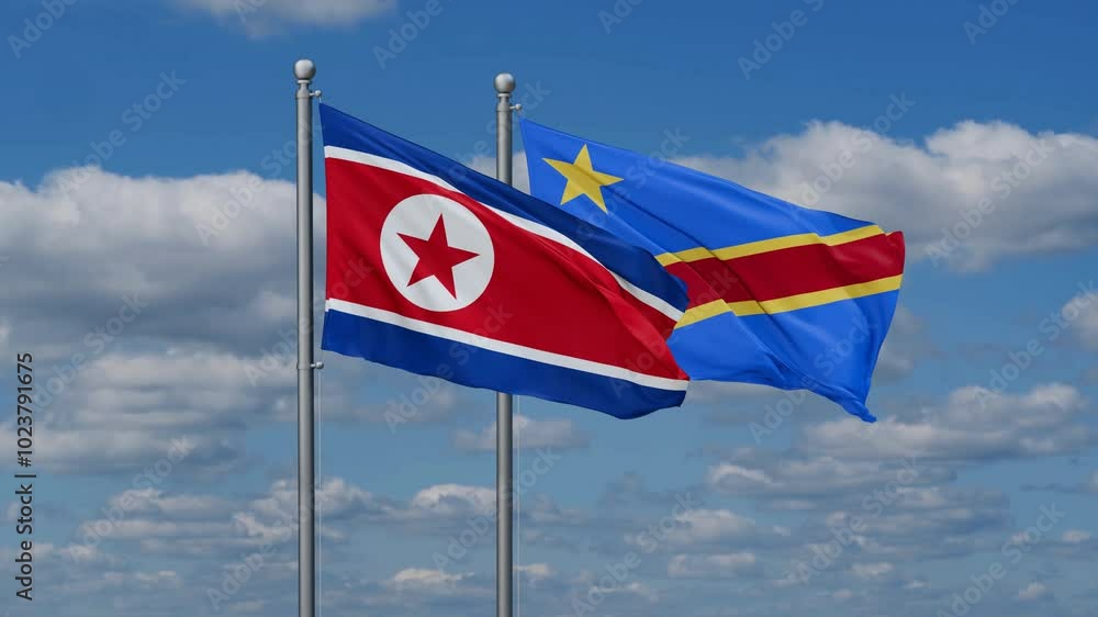 Democratic Republic of the Congo and North Korea flags flying together, video concept of the relationship, two country relations concept Democratic Republic of the Congo and North Korea flags flying together, video concept of the relationship, two country relations concept