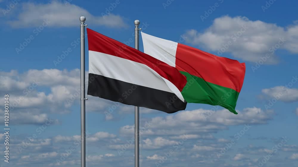 Madagascar and Yemen flags flying together, video concept of the relationship, two country relations concept Madagascar and Yemen flags flying together, video concept of the relationship, two country relations concept