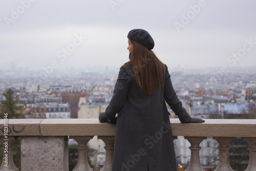 Contemplating Paris from Montmartres Viewpoint on a Misty Day  photo