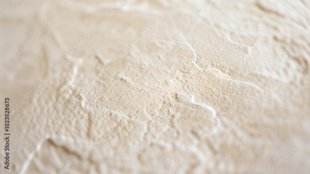 Closeup texture of soft beige surface with subtle patterns Closeup texture of soft beige surface with subtle patterns