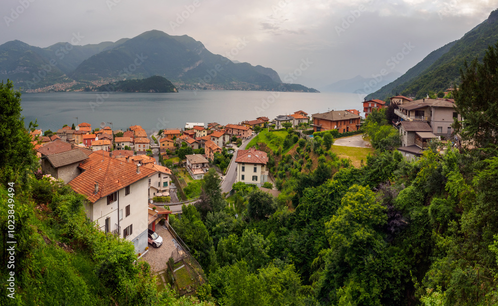 Charming Lake Como Village Overlooking Serene Waters and Green Hills