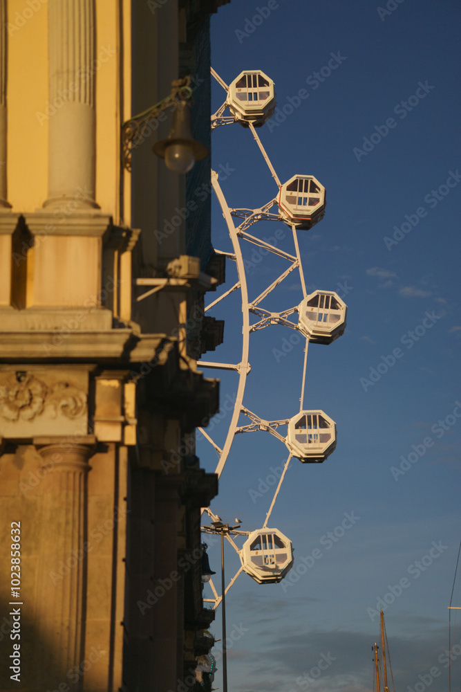 Historic Facades and Ferris Wheel in Barcelona Historic Facades and Ferris Wheel in Barcelona