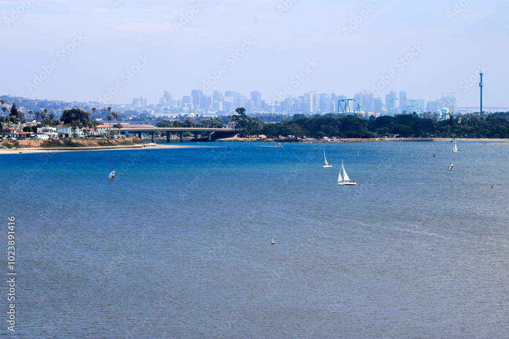Obraz premium Cityscape of city of San Diego as seen from north side of Mission Bay, California in Summer