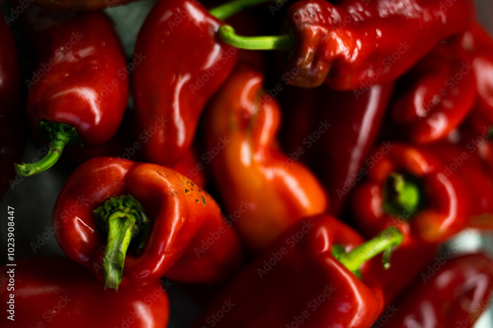 Juicy red pepper close-up for sale at the vegetable market Juicy red pepper close-up for sale at the vegetable market