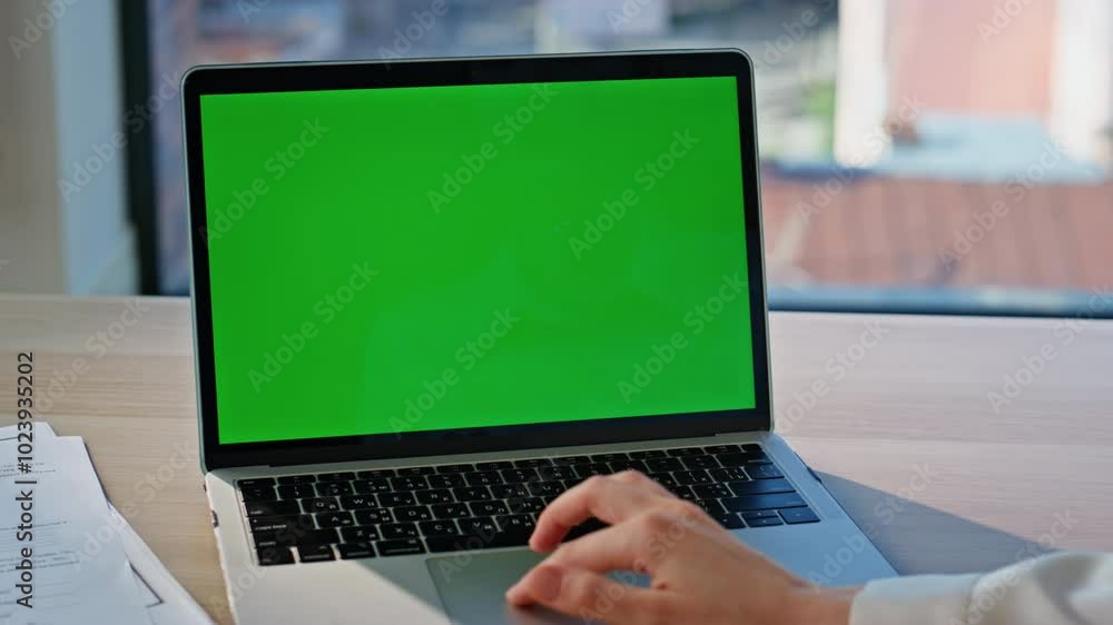 Programmer hand working laptop with green screen closeup. Unknown businesswoman Programmer hand working laptop with green screen closeup. Unknown businesswoman