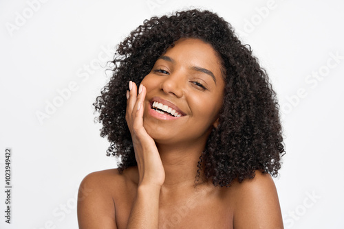 Portrait of happy young African woman model pampering enjoying healthy glowing face perfect skin care tone advertising facial beauty treatment cosmetic products isolated on white background.