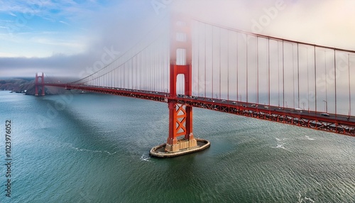 Iconic bridge shrouded in fog photo