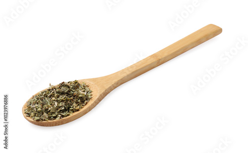 Dried oregano in spoon isolated on white