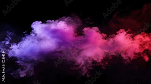 Colorful purple and red smoke swirling on a black background. Abstract vapor and artistic background concept.