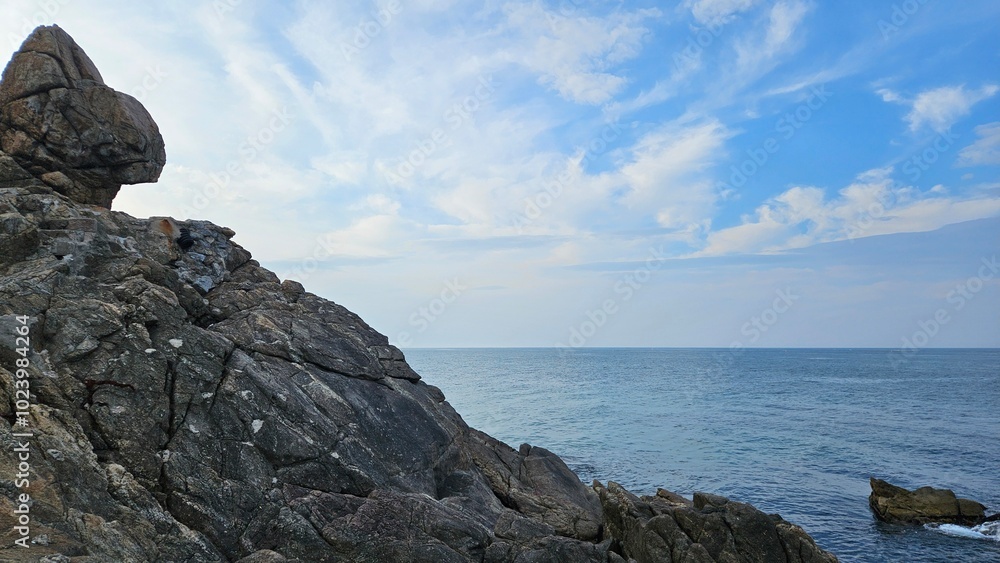 The beautiful blue sea in the distance Looking at Lion Rock The beautiful blue sea in the distance Looking at Lion Rock