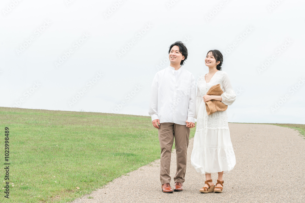 旅行・ハネムーン・新婚旅行・リゾート・ウェディング・青空の中を歩く夫婦・カップル
旅行・ハネムーン・新婚旅行・リゾート・ウェディング・青空の中を歩く夫婦・カップル