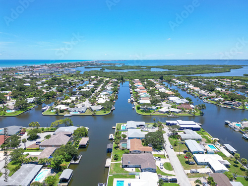 Residential homes along canals in Cocoa Beach on Florida's Space Coast in Brevard County	 photo