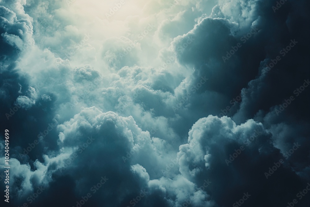 Dark, Dramatic Clouds Illuminated by Sunlight in the Sky During the Late Afternoon Hours Dark, Dramatic Clouds Illuminated by Sunlight in the Sky During the Late Afternoon Hours