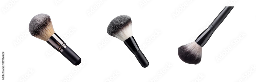 Three powder brushes with black handles and white and black bristles on a white background. Three powder brushes with black handles and white and black bristles on a white background.
