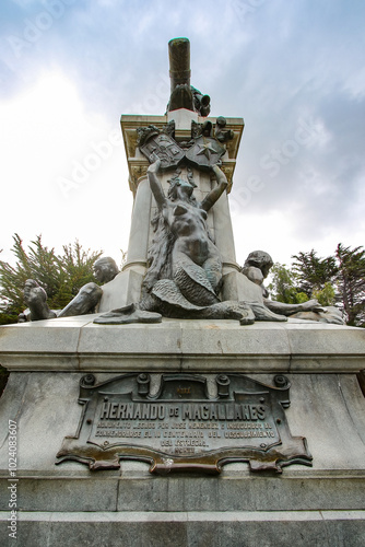 Statue of Fernando Magellan at the center of MuÃ±oz Gamero Square (Plaza de Armas) in downtown Punta Arenas, the southernmost city of Chile, South America photo