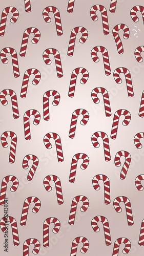 Festive Christmas seamless vertical pattern featuring sweet red and white striped peppermint candy canes scattered on a soft pink background.