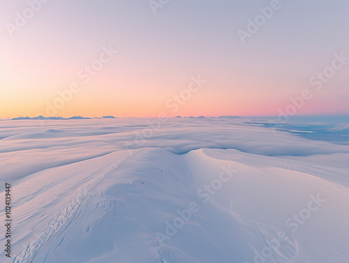 aerial view of snow-covered peaks and frozen lakes