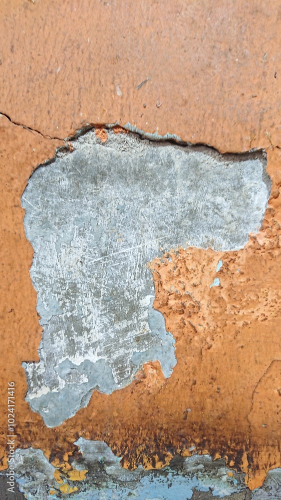Obraz premium close up texture of torn orange wall with soft shadow 