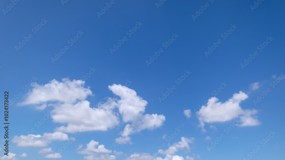 clear blue sky background,clouds with background, Blue sky background with tiny clouds. White fluffy clouds in the blue sky. clear blue sky background,clouds with background, Blue sky background with tiny clouds. White fluffy clouds in the blue sky.
