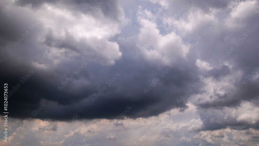 Dark sky with stormy clouds. Dramatic sky rain,Dark clouds before a thunder-storm. Dark sky with stormy clouds. Dramatic sky rain,Dark clouds before a thunder-storm.