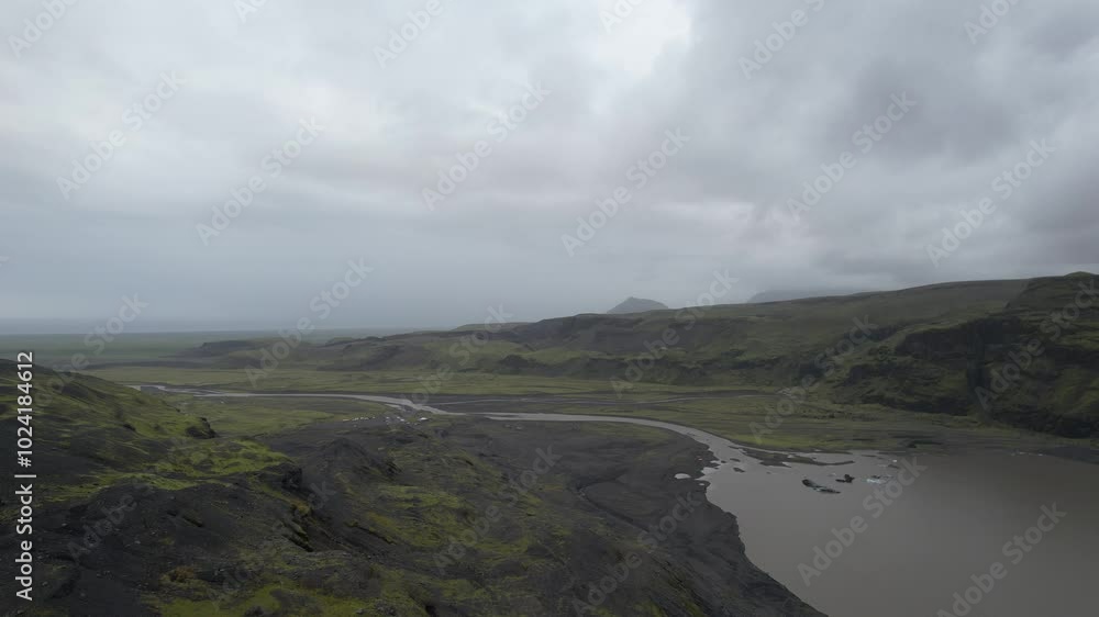 Typical Icelandic Mountains and the Glacier river. Filmed with a Drone in South Iceland. Different shots available in my portfolio. Typical Icelandic Mountains and the Glacier river. Filmed with a Drone in South Iceland. Different shots available in my portfolio.