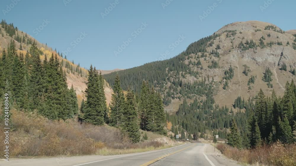 POV Driving Car at Million Dollar Highway during fall season from Ouray to Silverton in southwestern Colorado Offering breathtaking mountain, valley and gorge views POV Driving Car at Million Dollar Highway during fall season from Ouray to Silverton in southwestern Colorado Offering breathtaking mountain, valley and gorge views