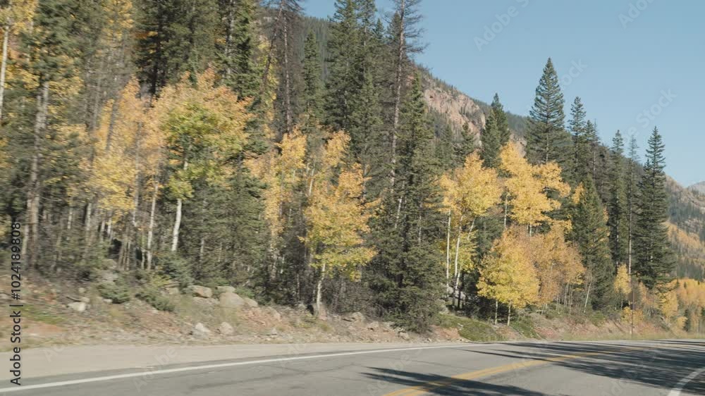 POV Driving Car at Million Dollar Highway during fall season from Ouray to Silverton in southwestern Colorado Offering breathtaking mountain, valley and gorge views POV Driving Car at Million Dollar Highway during fall season from Ouray to Silverton in southwestern Colorado Offering breathtaking mountain, valley and gorge views
