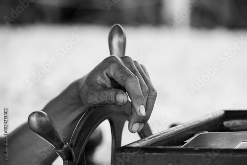 Wallpaper Mural Light touch.  A boatman's hand rests gently on the helm of a ferry in Bangkok. Torontodigital.ca
