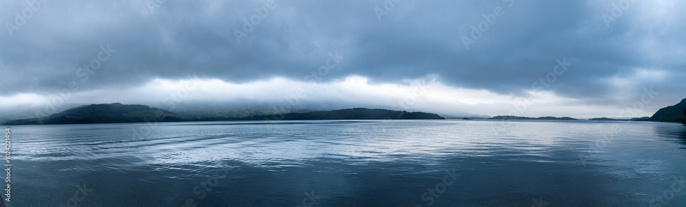 Fototapeta premium Panoramic view over Loch in Scotland, Evening panoramic view Scottish Highlands