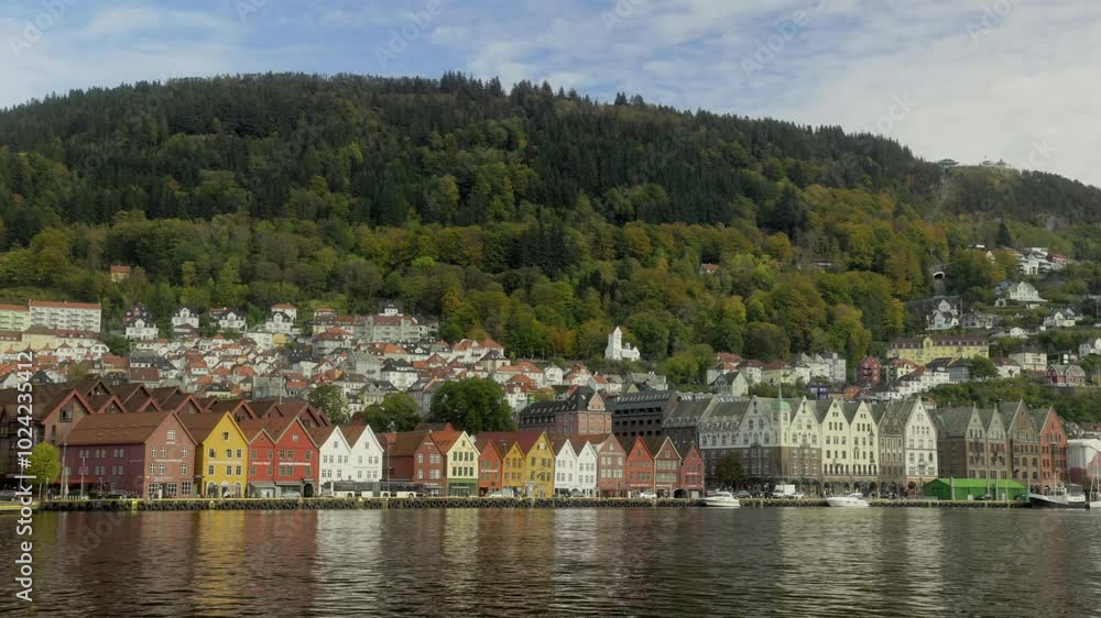 Bryggen in Bergen and mount Floyen on a beautiful sunny day Bryggen in Bergen and mount Floyen on a beautiful sunny day
