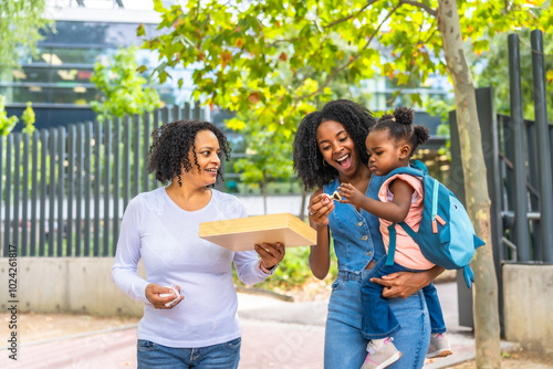 Three generation african family in a public park