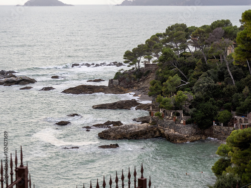 Fiascherino beach, municipality of Lerici, Gulf of La Spezia in Liguria, Italy, Europe. On the horizon the famous town of Portovenere or Porto Venere photo