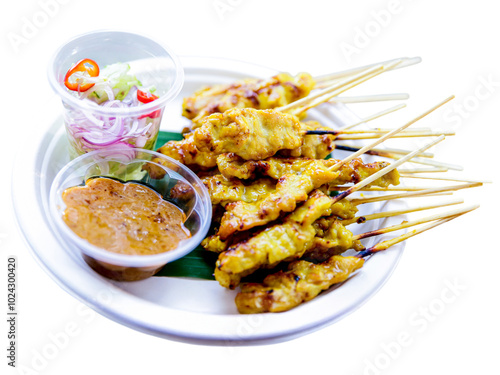 Canvastavla Delicious Chicken Satay: A mouthwatering platter of grilled chicken satay skewers, served with a vibrant side salad and rich peanut sauce