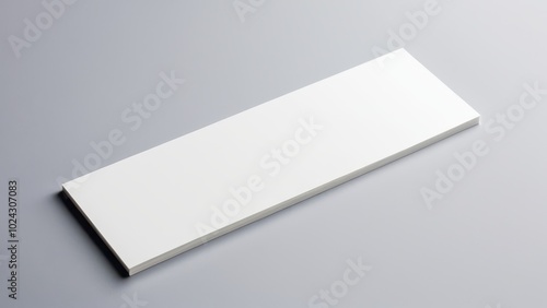 Obraz na płótnie Minimalist bookmark mockup showing a classic, rectangular bookmark in a neutral setting. Great for use in digital or print media presentations, focusing solely on the bookmark design w salonie