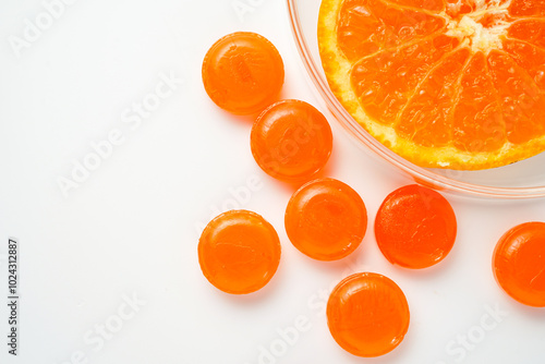 medical Lozenges tablets orange flavor on a white background