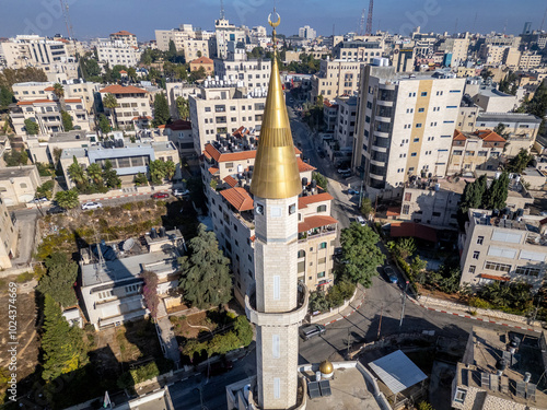 Gold-clad minaret at a mosque in downtown Ramallah, the capital of the Palestinian Territories in the West Bank