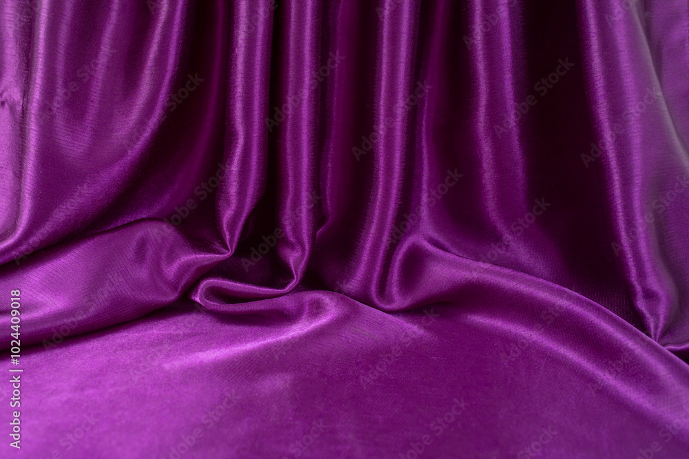 Fototapeta premium staged purple satin with folds and empty space for text or product placement