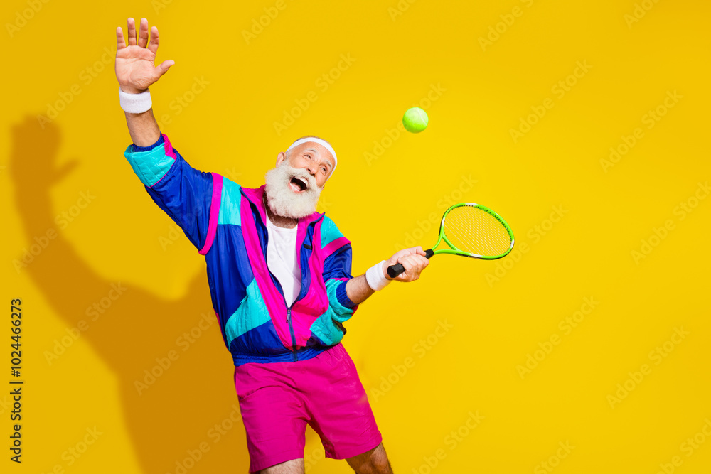 Photo poster of handsome granddad sportsman have fun tennis wear trendy vintage sportswear isolated on yellow color background Photo poster of handsome granddad sportsman have fun tennis wear trendy vintage sportswear isolated on yellow color background