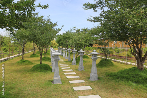 Wallpaper Mural View of traditional Japanese garden with walk pathway and lantern pole. Torontodigital.ca