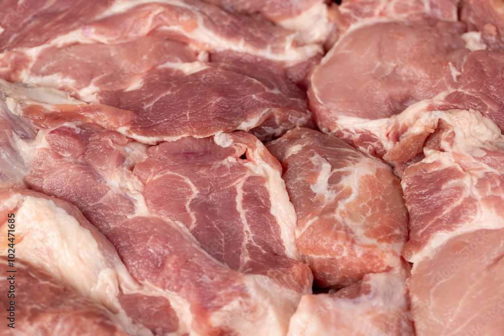 a sliced piece of pork meat from the neck a sliced piece of pork meat from the neck