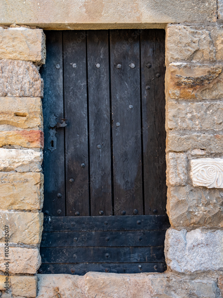 a closeup shot of an old wooden door a closeup shot of an old wooden door